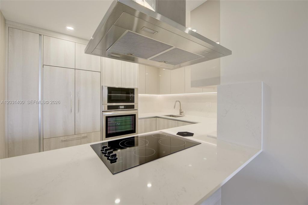 Photo of 600 Three Islands Blvd #403, Hallandale Beach, FL 33009 (MLS # A12031400)