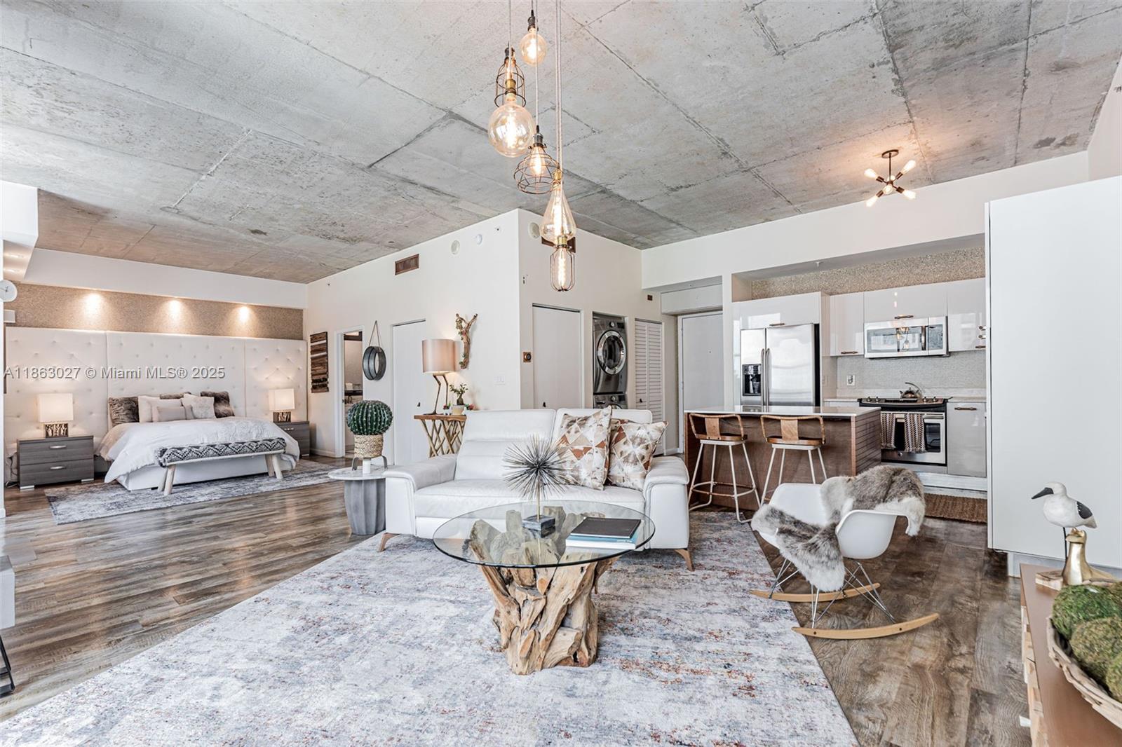 An updated loft-style 1/1 residence that blends modern convenience with vibrant Downtown Miami living. This furnished smart home features keyless entry, blackout and transparency shades, dimmable lighting, built-in speakers, and a customized walk-in closet. Enjoy partial bay and city views, plus a full-size washer and dryer inside the unit. Located in the heart of Downtown Miami, the MetroMover stop is right below the building for convenient access north or south—including Brickell, UM, and the hospital districts. Close to Bayside Marketplace, 4 blocks from Kaseya Arena, and surrounded by countless restaurants and shops. Amenities include a rooftop pool, gym, lap pool, hot tub, and 24-hour concierge. Currently tenant-occupied with a lease at $2,900/month. Building allows short-term rentals