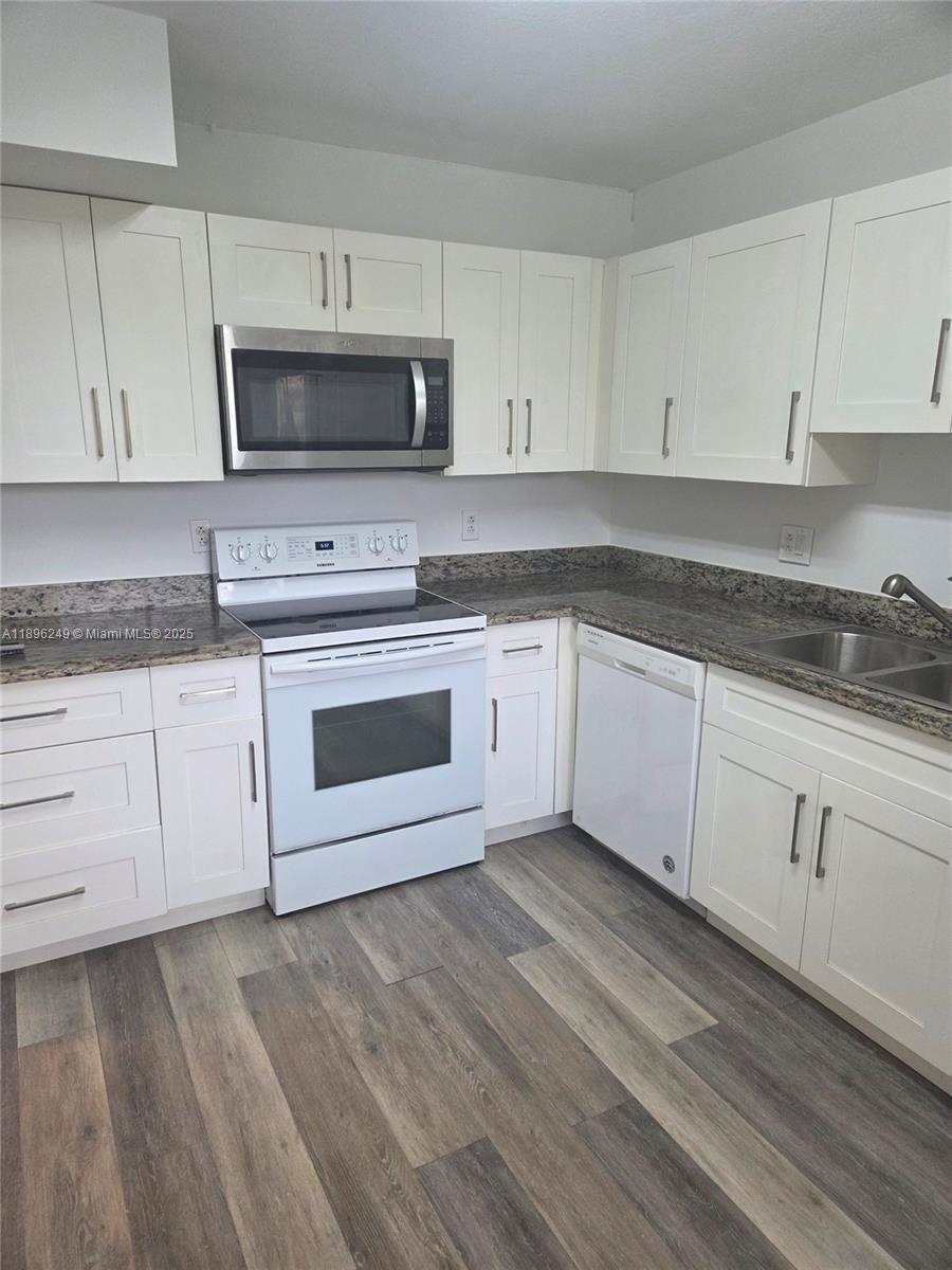 RACQUET CLUB APARTMENTS A - Residential Lease