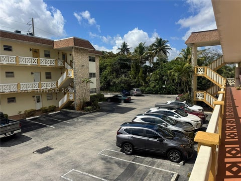 Photo of 5121 W Oakland Park Blvd #202, Lauderdale Lakes, FL 33313 (MLS # A12103508)