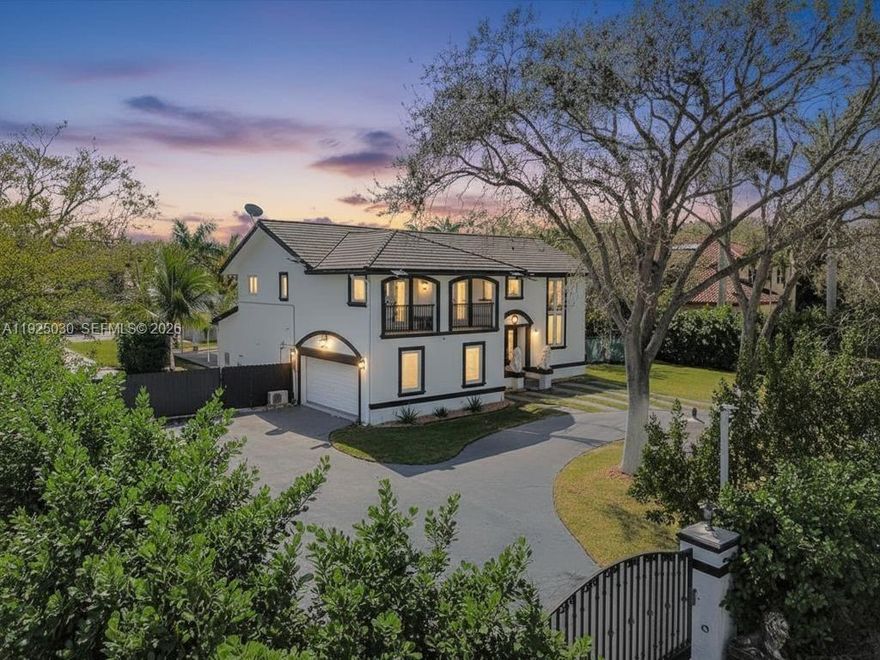 Experience ultra-modern living in this fully reimagined 2023 two-story estate set on nearly one acre in the heart of Pinecrest. A grand circular gated driveway welcomes you to a residence featuring elegant porcelain flooring throughout, a split floor plan, and a designer gourmet kitchen with top-tier appliances. The main level features a spacious en-suite bedroom and a cabana bath, while the second floor offers a large den ideal for a media room or office. The expansive primary suite features a private balcony and a boutique-style closet. Outdoors, enjoy 38,000+ SF of land with a pool, BBQ area, and a separate 1 BD / 2 BA guest house. A versatile tennis court, currently used as additional covered parking for car enthusiasts, can easily be reconverted. Additional highlights include impact-resistant windows and doors, fully fenced, security cameras, and a premier location near top-rated schools, fine dining, and shopping. Also available for lease.