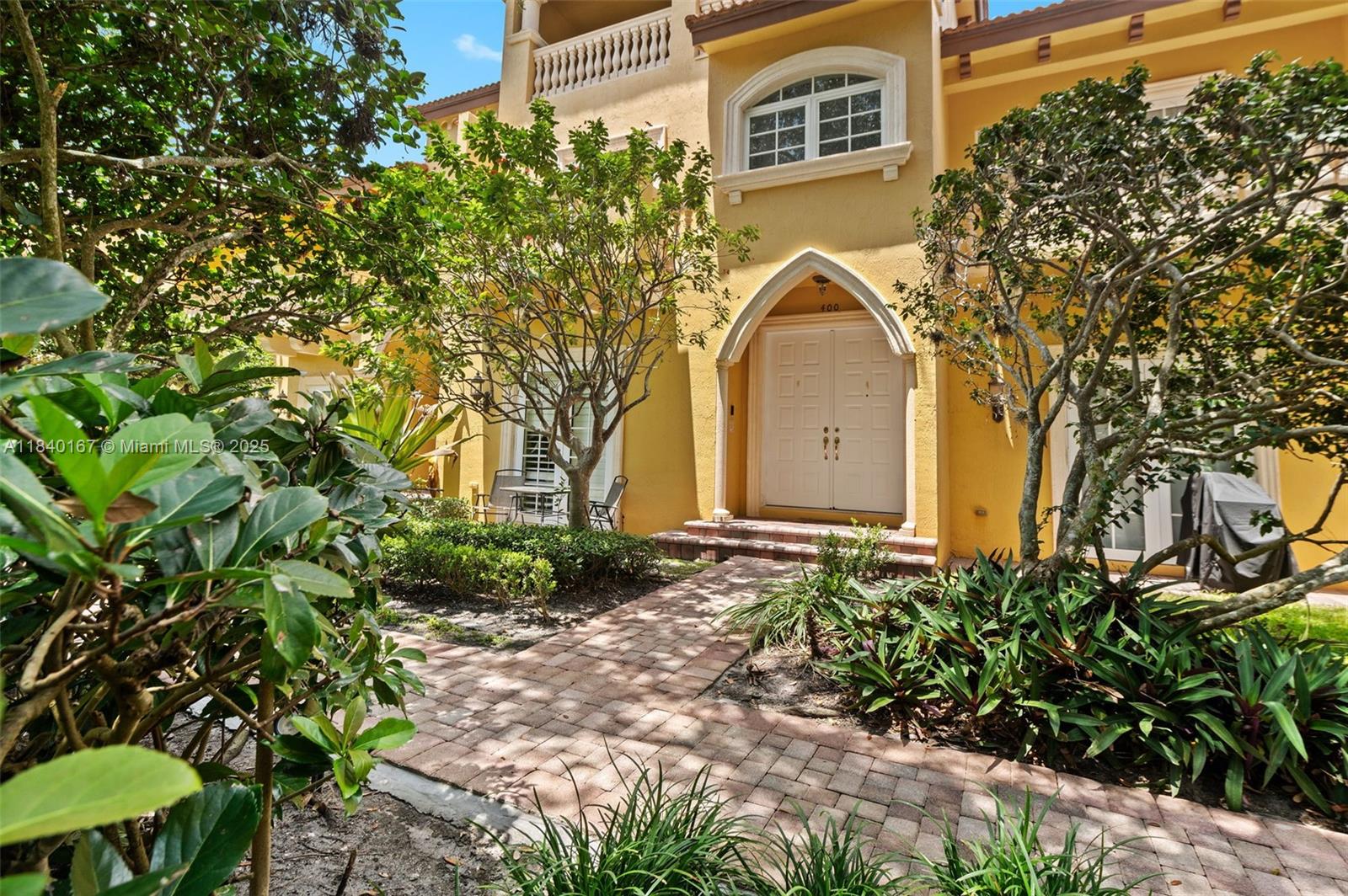 Discover this elegant 3-bedroom townhome located in the desirable gated community of Tuscany Village in East Boca Raton. This beautifully maintained residence features a private front entrance, lush landscaping, and classic Mediterranean-style architecture. Inside, enjoy a bright and spacious layout with an inviting foyer, formal living and dining areas, and warm wood floors throughout. The home includes an in-unit private elevator, a convenient DEN/home office, and a 2-car garage. All bedrooms are located upstairs, offering privacy and comfort, along with 2 full baths. The main level features a powder room, a well-appointed kitchen, laundry area, and ample living space. Ideally situated close to beaches, shopping, and top-rated schools. A rare opportunity in a quiet and upscale enclave!