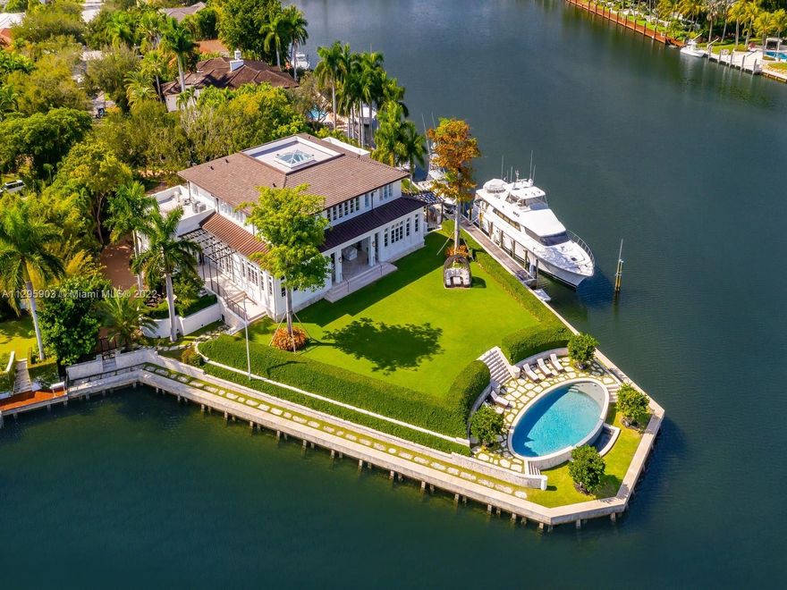Custom estate built in 2016 in the exclusive gated Old Cutler Bay sitting on a rare one acre peninsula lot w/435 ft of waterfront & a 75 ft dock. This completely smart home w/surround sound throughout offers a total sq ft of 19,380 SF with 7 bedrooms, 7.2 bathrooms w/the master bedroom on the main level. First floor also features formal & informal living spaces, formal dinning room, breakfast area, chefs kitchen w/ 3 subzero fridge/ freezers, bar area, temp. controlled wine cellar, library/ media room and office. Take elevator or stairs to the 2nd floor that features 4 guest suites, hobby room, 2 staff rooms, laundry room, and upstairs family room. The stunning backyard features a resort style pool/ jacuzzi, fire pit, full outdoor kitchen, & cabana bath. Home also features an 18 car garage
