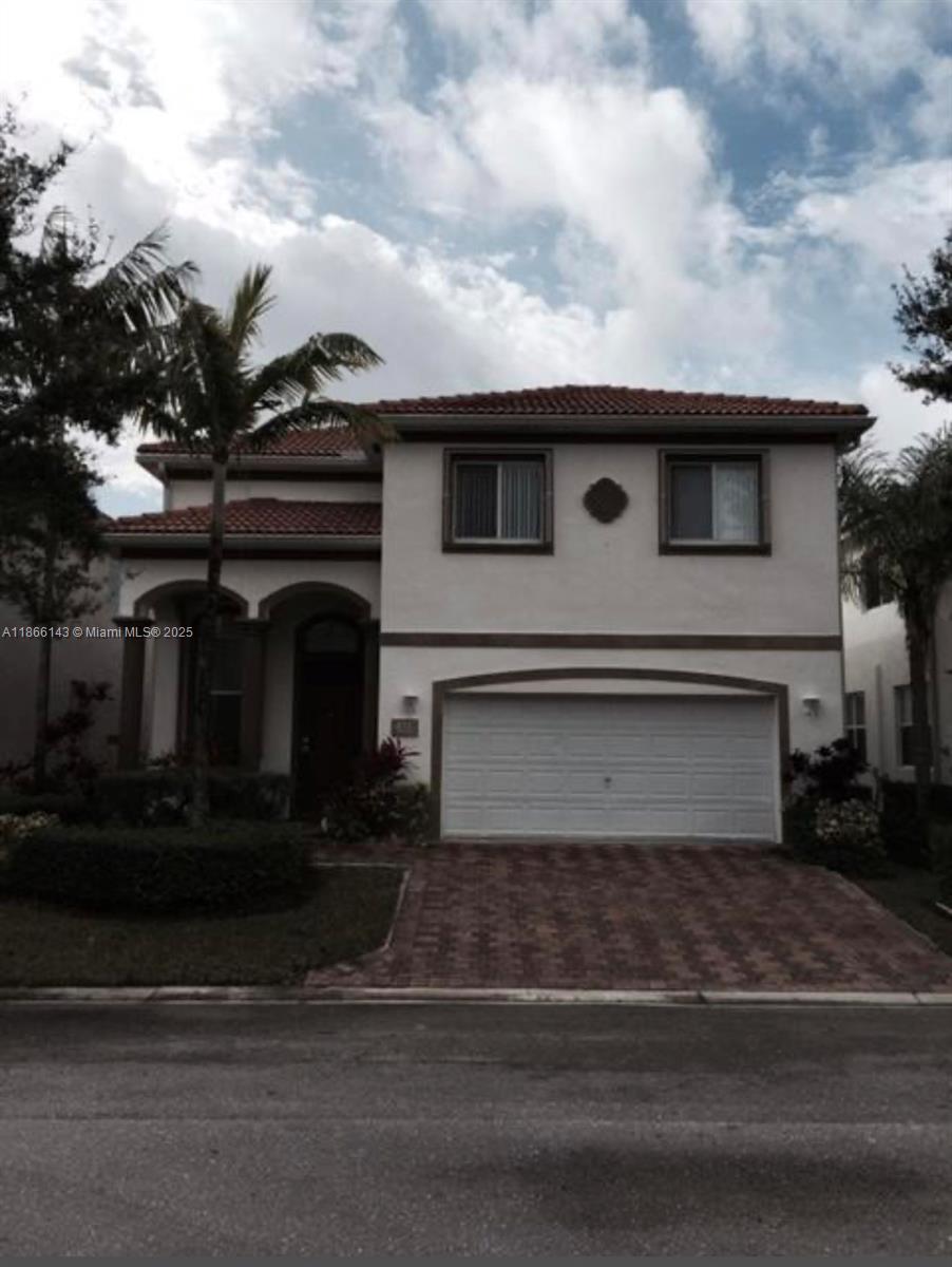 Awesome Opportunity to live in HUGE LAKE VIEW Home with tile throughout first floor, new carpet upstairs, 4 bedrooms 3 full baths, in a very nice gated community. Lawn and Cable included in rent.
