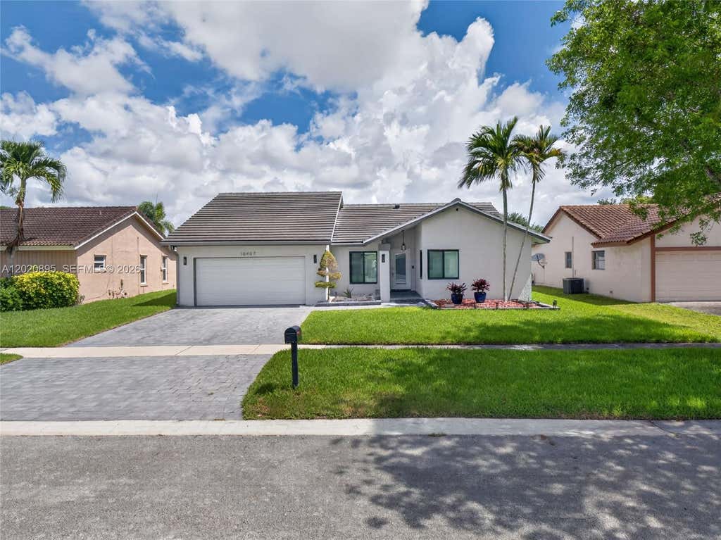Photo of 10407 NW 5th St, Plantation, FL 33324 (MLS # A12020895)
