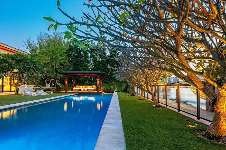 Designed by architect Cesar Molina, this sleek Bali inspired waterfront residence in coveted Golden Beach was rebuilt & modernized in 2012 and beautifully renovated in 2022 to perfection. This 2-story masterpiece boasts 6 BR 6+1 BA atop a 16,500 SF lot w/ 100’ on Intracoastal waterway. Perfect for entertaining & boat lovers. Throughout the home’s 7,200+ SF living area are light-filled spaces & natural luxurious finishes maximizing exposure to the outdoors. Downstairs living spaces, kitchen, and bedrooms designed to amplify views. Defining spaces warm up the airy modern floorplan with a casual family room. Blissful outdoor spaces by world-renowned Swiss landscape architect Enea Garden Design feature Orchid filled trees & a rich cumaru-wrapped gazebo.