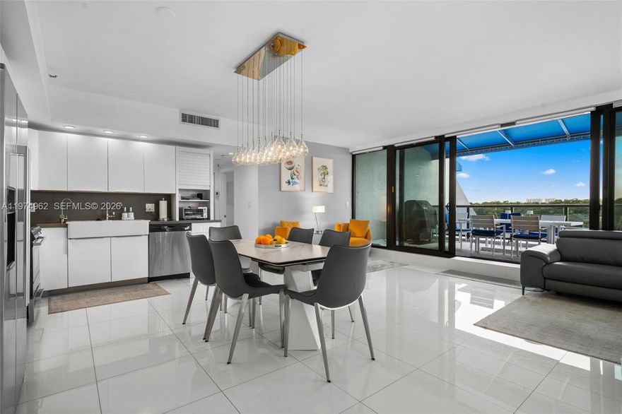 Available starting May 2026, till the end of November 2026. You won't find a bigger balcony in Sunny Isles. Amazing outdoor living experience with water views and colorful sunsets. Tastefully decorated 3 bedroom apartment that has it all to enjoy working from home or having friends over. The open kitchen concept allows you to enjoy the view while cooking. This apartment is filled with air and light. A Full Service gated community with a Private elevator that opens inside your apartment! it has pools, tennis courts, a spa and a gym!!! Steps away from the Ocean and all of Sunny Isles' social activities.