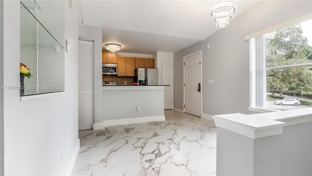 Photo of 1825 Palm Cove Blvd #7-201, Delray Beach, FL 33445 (MLS # A11922052)