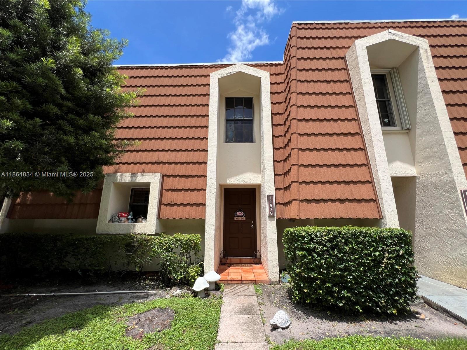 Discover this beautifully updated 2-bed, 2.5-bath townhome in the desirable Chateaulaine community of Plantation Acres. The home features a remodeled kitchen with wood cabinetry, granite countertops, and stainless steel appliances, plus a cozy patio perfect for morning coffee, outdoor dining, or entertaining. Upstairs, both spacious bedrooms have their own bath and walk-in closet, while the primary suite also offers a balcony for added charm. Recent upgrades include renovated bathrooms, a new water heater, and a modern A/C system for comfort and peace of mind. Tucked away at the end of a quiet cul-de-sac with no front or rear neighbors, this home provides privacy while still offering access to a pool, tennis courts, clubhouse, dog park, and nearby shopping, dining, and top-rated schools.