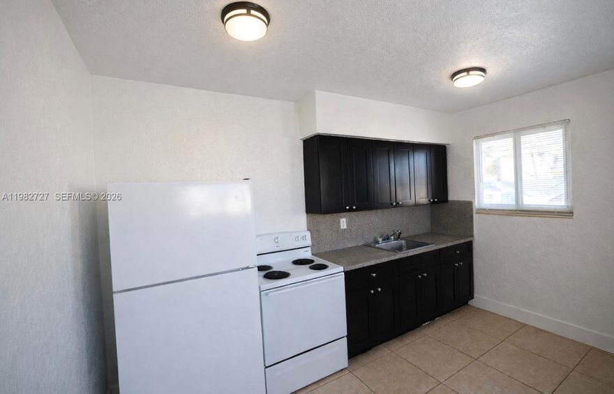 Check out this 1 bedroom 1 bathroom apartment located in the heart of Flagami. It features clean finishes, impact windows, tile flooring, and central air conditioning. The building offers plenty of open parking and street parking options. This prime location is just minutes away from Coral Gables, Miami International Airport, and major highway!