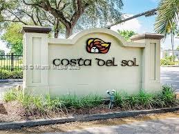 Discover this impeccably maintained townhome nestled in one of Doral’s most sought-after golf course communities. Surrounded by lush green spaces and offering full access to resort-style amenities, this home combines comfort and style. Fully remodeled kitchen with an open-concept design, upgraded appliances, and elegant laminated wood floors throughout second floor, ceramic on first floor. Enjoy indoor-outdoor living with a screened-in backyard, perfect for entertaining, and a charming courtyard entrance. Spacious bedrooms, also features accordion hurricane shutters, a one-car garage. This is your opportunity to live in a serene, neighborhood with amazing schools, shopping, dining, and major highways just minutes away.