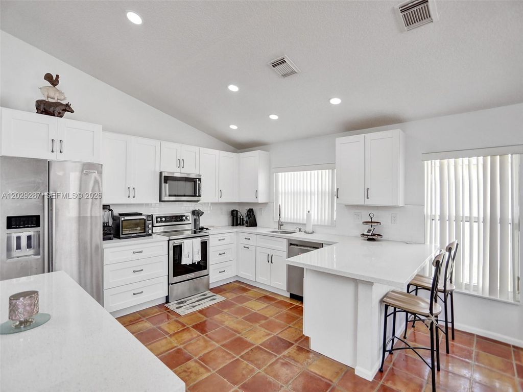 Photo of 16541 NW 5th St, Pembroke Pines, FL 33028 (MLS # A12029287)
