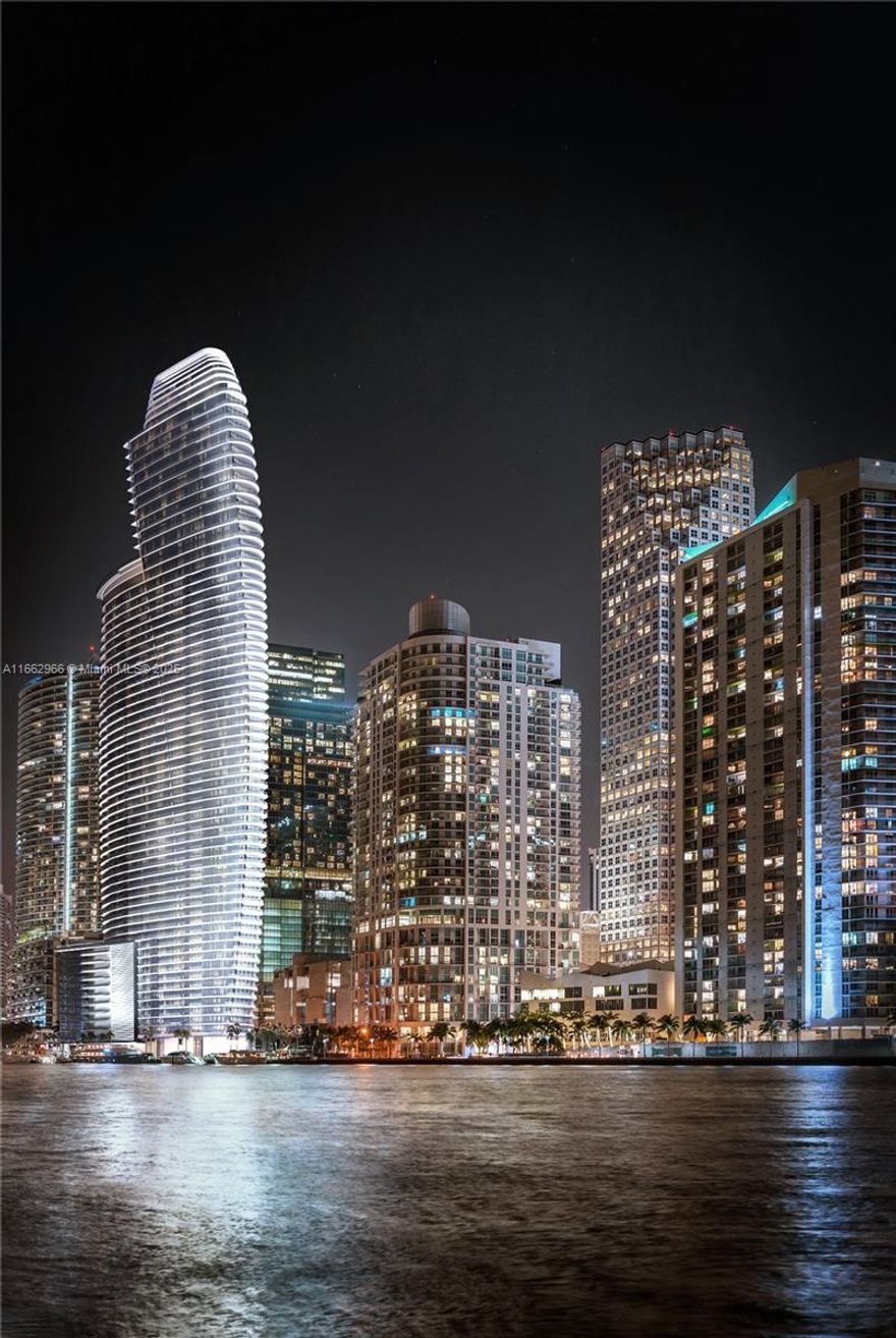Largest 07 line in the building. Unit 2607 at the Aston Martin Residences offers floor to ceiling 10 foot windows, expansive views of Biscayne Bay and City. Gaggenau appliances, California Style Closets & window shades included, The Aston Martin building is the pinnacle of Miami Luxury Living, featuring world-class amenities such as entertainment spaces, fitness center, spa, private movie theater & ultramodern gym. This 3 bedroom 2.5 Bathroom residences is a palace that overlooks one of the most interesting bodies of water in the World. Over 42,000+ sq. ft. of amenities on floors 52-55, including a state-of-the-art fitness center, spa, infinity pool, business center, kids and teens rooms, two private theaters, and much more. In the heart of the city, top dining, shopping, and nightlife.