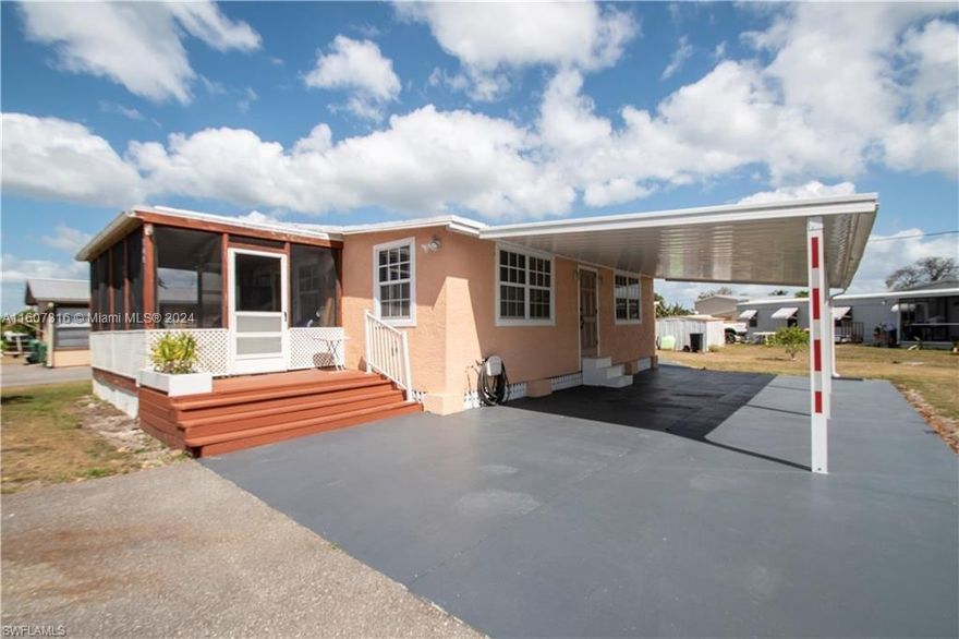 This renovated home presents a haven of comfort and style. Boasting a thoughtfully redesigned layout, it features 2 bedrooms, 2 baths, and an inviting open floor plan that seamlessly blends modern living with island charm. Step outside to the screened patio, where you can savor the island breeze and scenic views. Updates abound, including a newer air conditioner, hot water heater, and a convenient carport. Storage is plentiful with two sheds onsite, providing ample space for your belongings. Don't miss this opportunity to experience island living at its finest in this beautifully updated retreat. Discover the allure of Chokoloskee, a captivating 141-acre island enveloped by the enchanting expanse of the 10,000 islands.