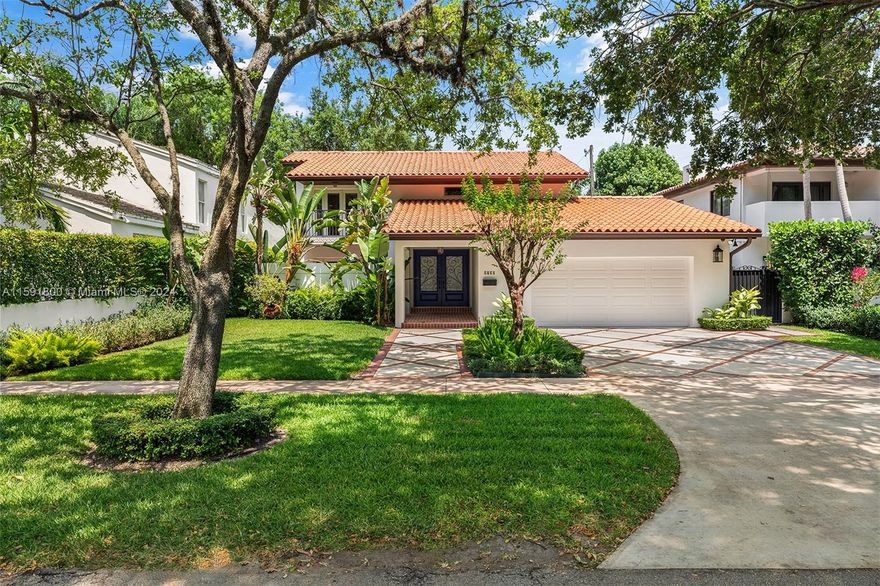 Welcome to this magnificent, fully renovated 2-story estate in South Coral Gables. Adorned with impact doors and windows, marble tile, and marble bathrms throughout. Upon entering, you are greeted by a charming living rm with its own front porch. The kitchen is fully updated with marble countertops, stainless steel appliances, and a slide-in Wolf gas range, seamlessly flowing into an elegant formal dining room. Ascending to the second floor, the master suite awaits, ft. a separate tub and shower, dual sinks, large walk-in closets, and balcony access. Additionally, there are two more bed rms that share a convenient Jack-and-Jill bathrm, also providing balcony access. Outside, enjoy the beauty of a fully blossomed Bougainvillea and a delightful area designed for relaxation or entertainment.