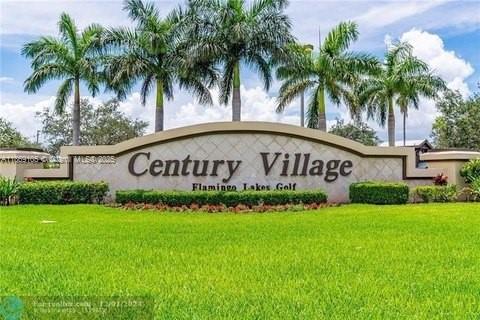55+ COMMUNITY Fully remodeled 2-bedroom, 1.5-bathroom condo in Century Village, offering a modern and open concept layout with a combined kitchen, living, and dining area. Experience resort-style living with exceptional amenities, spectacular clubhouse, Pools, tennis courts, gym, billiard room, card tables, and a theater. Association requires a minimum credit score of 650.