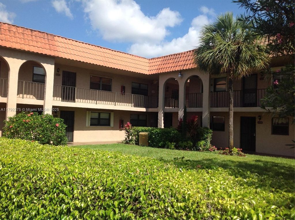 Photo of 1921 W Woolbright Rd #B202, Boynton Beach, FL 33426 (MLS # A11792375)