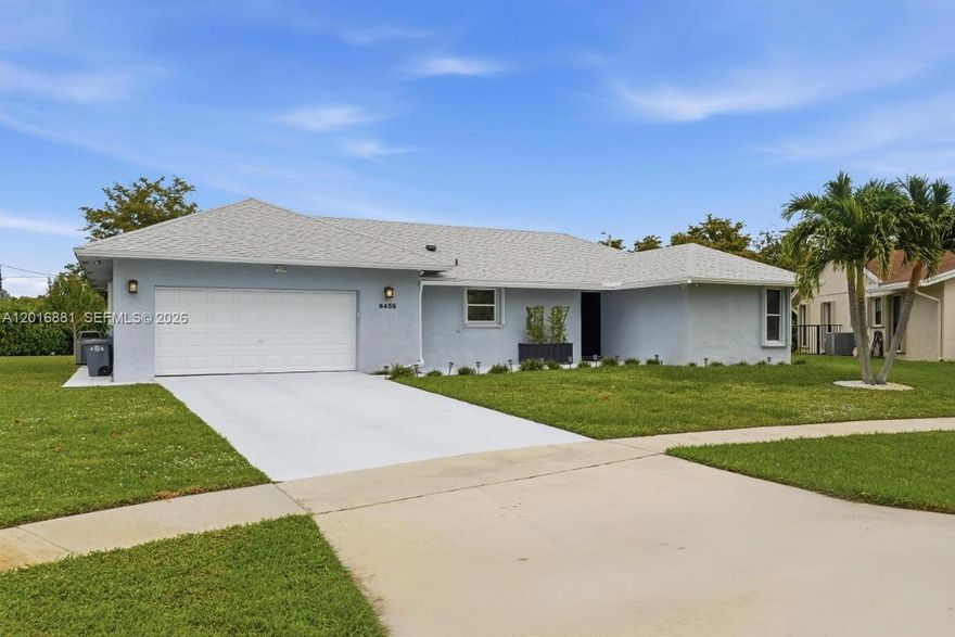Beautifully updated 2BR/2BA single-family home in desirable Coco Wood Lakes, in Delray Beach! This move-in ready residence features a new 2024 roof, open floor plan, remodeled kitchen with custom KraftMaid cabinetry, granite countertops, island seating & modern finishes, plus updated bathrooms and porcelain tile throughout. Relax in the large screened-in patio overlooking the private backyard. Additional features include hurricane shutters, hurricane-rated garage door, 2-car garage, newer Trane A/C, 2024 water heater, and newer Maytag washer/dryer. Situated on a nearly 1/3-acre lot with no rear neighbors, mango trees, room for a pool, and low-maintenance landscaping. Active 55+ community with low HOA that includes: clubhouse, pool, fitness center, sauna, pickleball, cable & fiber optic internet. Minutes to downtown Delray & beaches! Please ask us about the 3-2-1 approved lender buydown. Meaning you get an interest rate as low as 3%! On Zillow, scroll down to "facts & features", click on "show more", then click "View virtual tour" for your Virtual Interactive Lifestyle Concierge!
