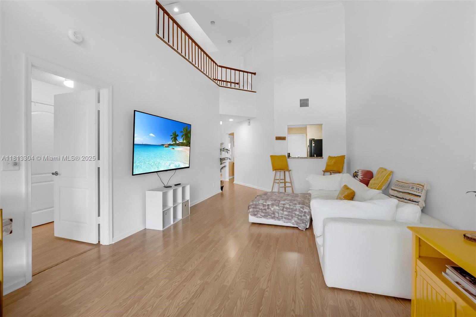 Bright & stylish 3BD | 2.5BTH townhome with 1 car garage located in the community of Boca Gardens! A vibrant community with A-rated schools in! Emphasizing a generous layout, ample living room with laminate floors throughout, soaring ceilings & tons of natural light. Convenient primary bedroom on ground floor with a large walk-in closet, complete with a remodeled bathroom, double sink vanity & roman tub. Features include granite kitchen countertops, generous room sizes, custom built-ins in all closets, extra storage under stairs, accordion shutters. Relax on screened front & back patios. Community amenities include multiple pools, a fitness center, tennis and pickleball courts, basketball court, and a playground—offering something for everyone to enjoy!