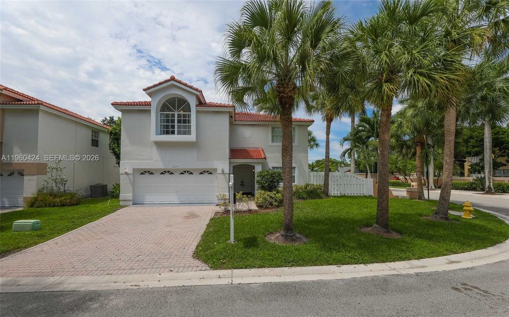 Photo of 13377 NW 7th St, Plantation, FL 33325 (MLS # A11960424)