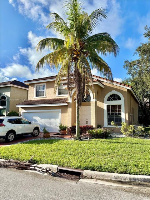 Photo of 306 NW 115th Way, Coral Springs, FL 33071 (MLS # A11881797)