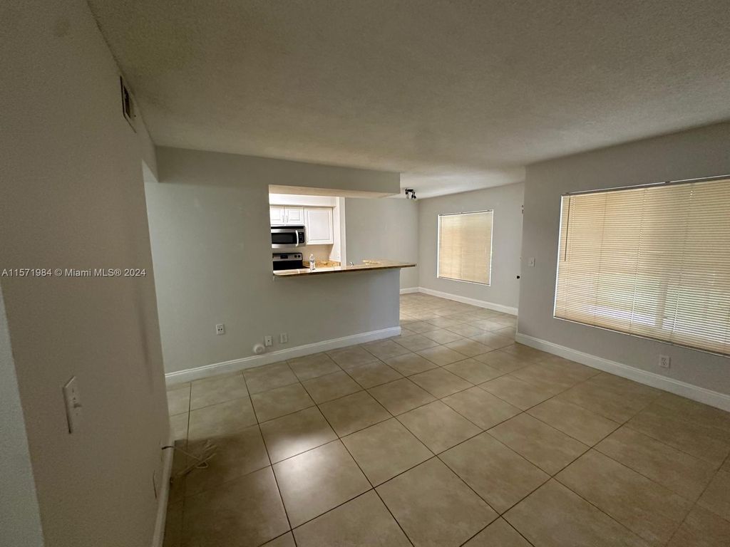 Photo of 815 W Boynton Beach Blvd #13-104, Boynton Beach, FL 33426 (MLS # A11571984)