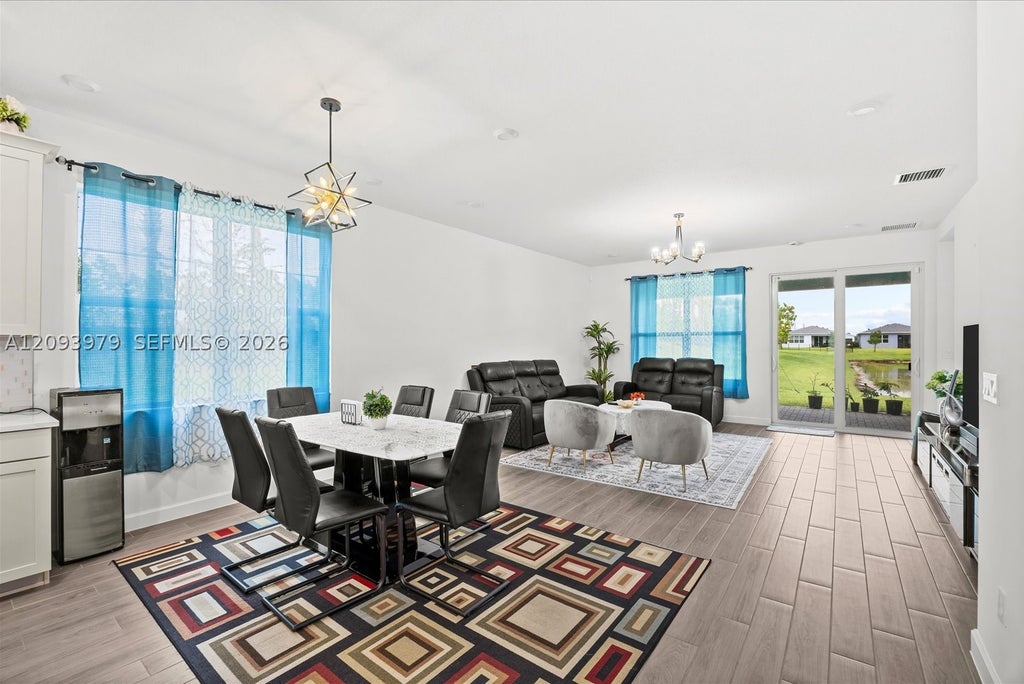 Photo of 8996 SW Remy Ln, Port St Lucie, FL 34987 (MLS # A12093979)