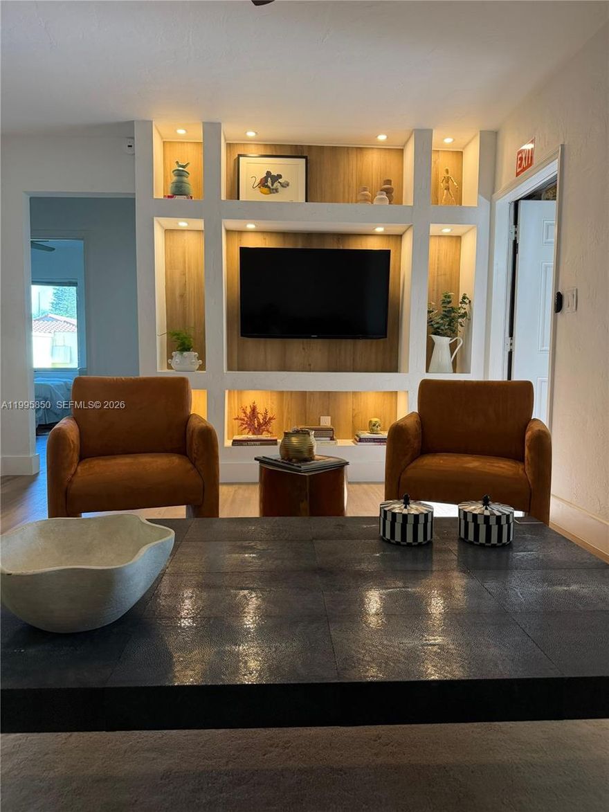 Experience this beautifully curated short term rental nestled in the serene neighborhood of Biscayne Park — where modern comfort meets relaxed Miami living.

2 Bedrooms | 1 Bathroom

Step into a bright, open-concept space featuring:
-Stylish living room with designer furnishings  
-Seamless dining area perfect for entertaining  
-Cozy lounge space with warm, inviting tones  
-Two thoughtfully designed bedrooms with natural light  
-Sleek, modern bathroom with spa-like touches  

PRIVATE BACKYARD OASIS
Enjoy your own outdoor escape:
-Lush tropical landscaping  
-Outdoor dining area  
-BBQ space ideal for gatherings   
-Peaceful setting to relax and unwind  

UNBEATABLE LOCATION
-10 minutes to Bal Harbour & the beach  
-15 minutes to Miami International Airport  
-20 minutes to Aventura Mall  
-20 minutes to the Design District /wynood/Edgewater

This home offers the perfect blend of style, comfort, and convenience, ideal for your vacation.