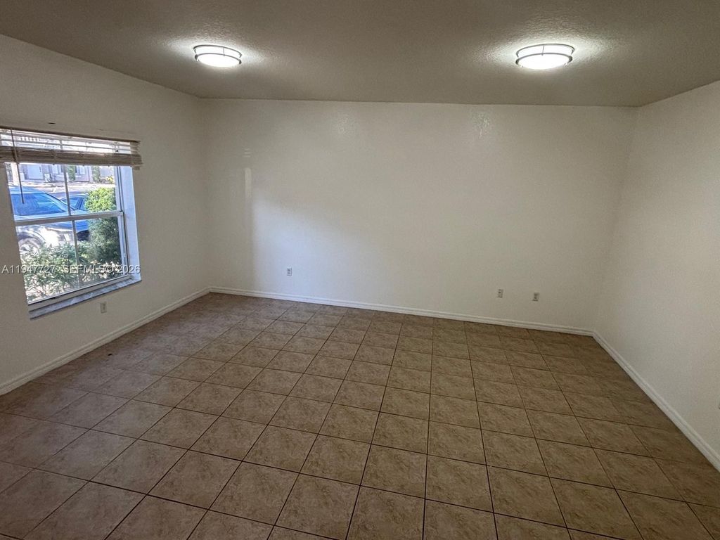 Photo of 4911 SW 140th Ter #6, Miramar, FL 33027 (MLS # A11947727)