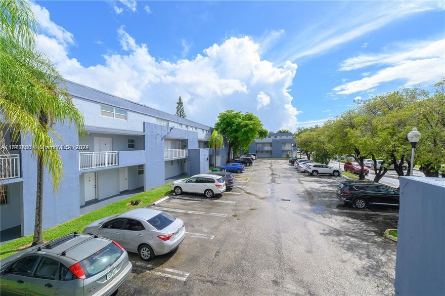 Relaxing Lake View,Assigned Parking, Beautiful 2/1.5, 2-story condo town home style w/2 balconies, spacious 1,125 sq ft., tiled, big laundry w/full size Washer/Dryer upstairs, Super Spacious main suite w/private balcony upstairs, walk-in closet, 4th floor (last floor/no noise above you), Bldg. has 2 elevators. Association only allows 2 cars per unit & 2 pets 25 lbs. total for both pets. Plenty of guest parking. Amenities: 3 Swimming Pools, Gym, BBQ areas around lake, Children Playground, & other amenities w/future renovations (tennis court, racket ball). Bldg. L completed 40 yr. re-certification but not other buildings.