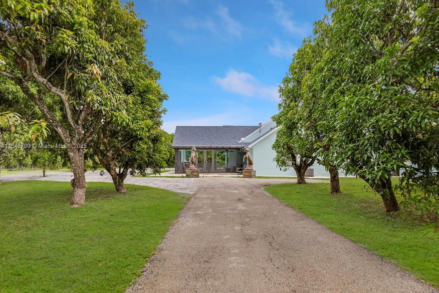 Redlands living at its finest! This sprawling 10 acre property will not disappoint, and has been completely remodeled with only the finest materials and finishes! Everything has been updated---roof, plumbing, electrical, water filtration systems, impact windows, and more! Open living area with high ceilings and recessed lighting! Large closets, all with custom shelving. Beautiful kitchen with stone counter tops and wood cabinets and a full array of SS appliances! Second floor features a glass staircase with entertainment area, playroom, bathroom, and huge balcony overlooking the grounds. Sunroom, Tiki area, outdoor kitchen, workshop, and more! Property is completely fenced, with separate area for farm animals. Income producing mango & avocado, and has Ag exemption! Sellers motivated!