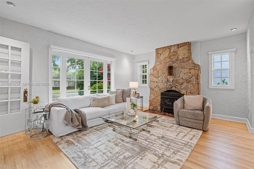 Timeless 1924 Old Spanish residence in the heart of Coral Gables, thoughtfully reimagined to blend historic character with modern luxury. Architectural details include a classic barrel tile roof, arched doorways, gorgeous HARDWOOD fllors, all with a Mediterranean-inspired design. The main home features a fully renovated kitchen and spa-inspired baths with high-end finishes and an open, functional layout. Major upgrades in the last 3.5 years include a NEW ROOF, PGT HURRICANE IMPACT windows and doors, top of the line Carrier HVAC, updated electrical systems, new plumbing with copper line from the main, water heater, septic tank, sprinkler system, and new window shades. A detached "CASITA" offers approx. 200 sq ft of air-conditioned space—ideal for a guest suite, office, or gym. Light-filled interiors enhance warmth and elegance. Ideally located on a tree-lined street near top schools, dining, and shopping—this move-in-ready Gables gem offers history, flexibility, modern comfort with peace of mind. Come explore this beauty at our Open Houses this weekend! Friday 5-7pm | Saturday 11am-2pm | Sunday 1-3pm.