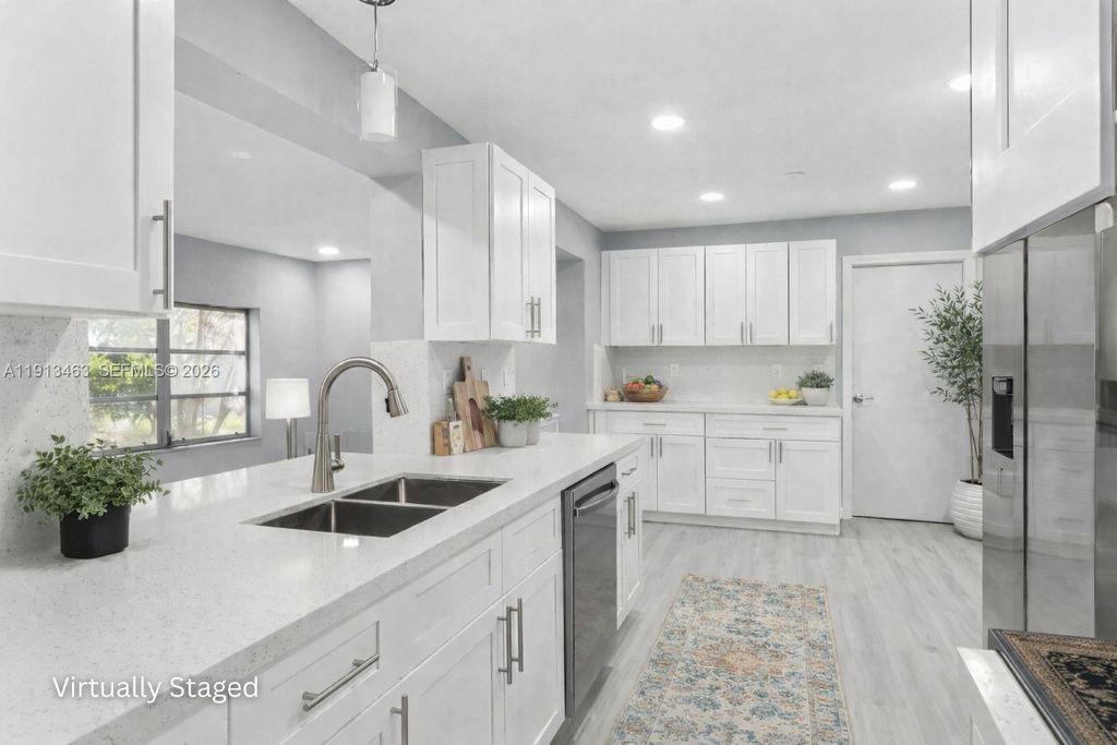 Photo of 6800 NW 58th Ct, Tamarac, FL 33321 (MLS # A11913463)