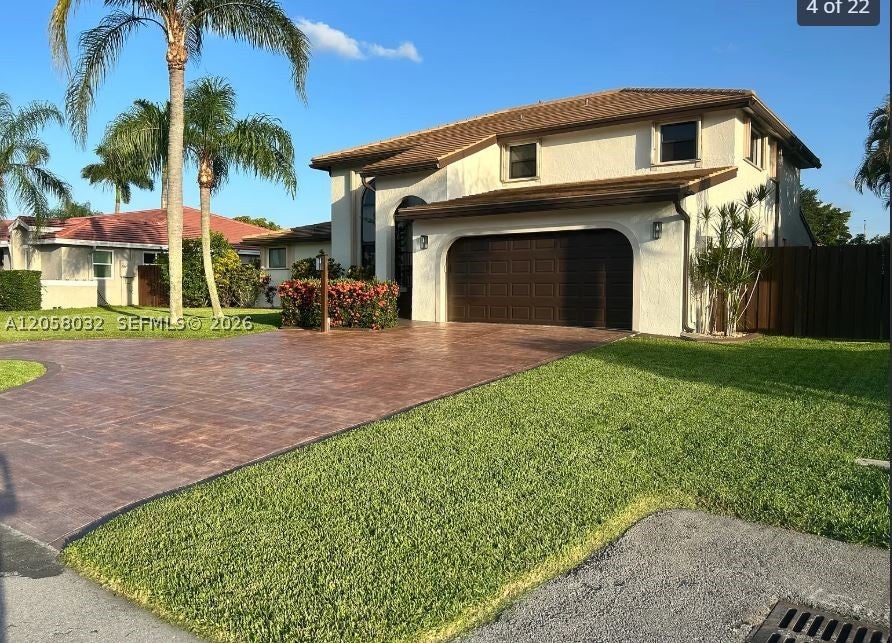 Photo of 15832 Stonetower St, Davie, FL 33331 (MLS # A12058032)