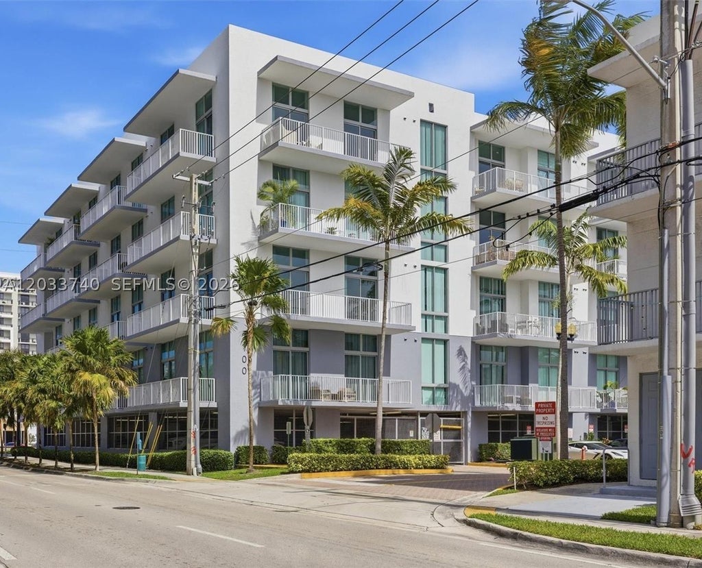 Photo of 2100 Van Buren St #322, Hollywood, FL 33020 (MLS # A12033740)