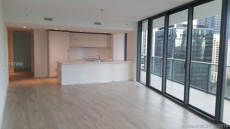 PRICE JUST REDUCED FOR A QUICK SALE! MOTIVATED SELLER! COMPLETELY FINISHED BEAUTIFUL UNIT WITH FLOORS THROUGHOUT.  BY PHILIPE STARK THIS GORGEOUS 3/2 1/2 PLUS DEN IN HEART OF BRICKELL HAS THE MOST GORGEOUS VIEWS OF SKYLINE AND OCEAN (WRAP-AROUND BALCONY). BUILDING INCLUDES WORLD-RENOWNED RESTAURANTS/BARS AT STREET LEVEL. AMENITIES INCLUDE: LOBBY, GYM, SPA, MOVIE THEATER, TWO POOL AREAS. EXTENDED HOTEL SERVICES FOR RESIDENTS. SF AS PER DEVELOPER'S FLOOR PLAN.