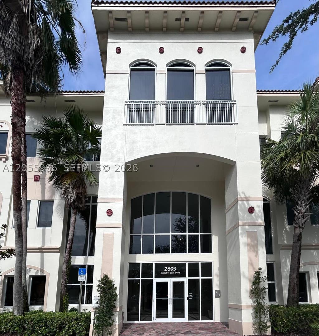 Photo of 2893 Executive Park Dr #105, Weston, FL 33331 (MLS # A12055906)