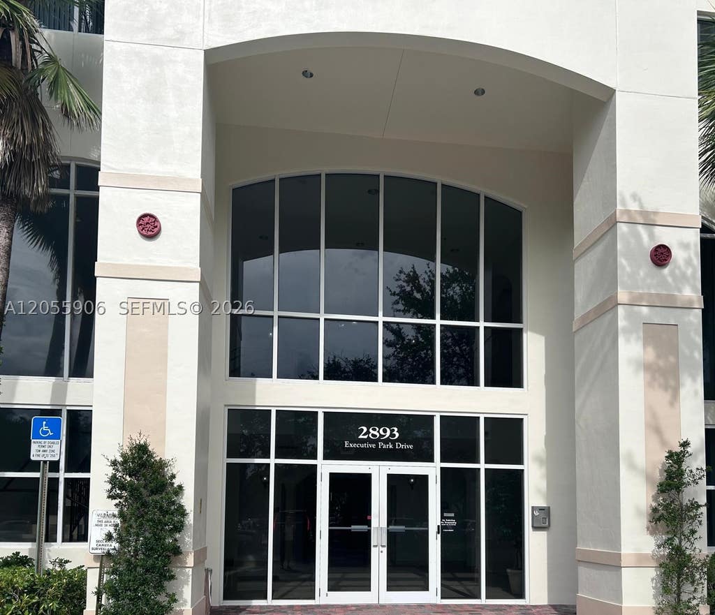Photo of 2893 Executive Park Dr #105, Weston, FL 33331 (MLS # A12055906)