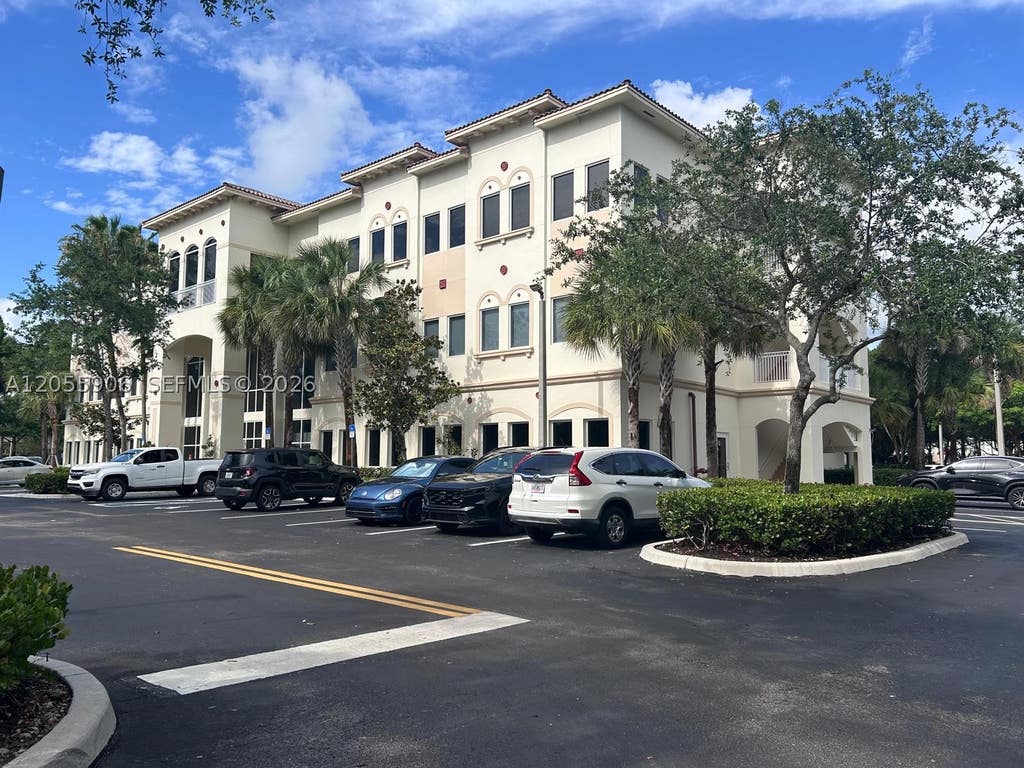 Photo of 2893 Executive Park Dr #105, Weston, FL 33331 (MLS # A12055906)