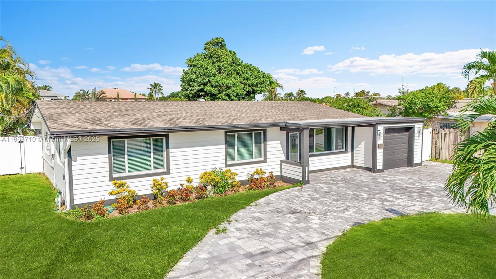 Welcome to this 3/2 waterfront pool home with a flex room ideal for an office, gym or potential 4th bedroom in desirable Snug Harbor. This move in ready home has an updated kitchen with solid wood cabinets, SS appliances, wine cooler, granite countertops, impact doors & windows, tile floors & large indoor laundry room for a perfect blend of comfort & style. For your outdoor enjoyment, this residence boasts 70 ft of waterfront, a dock, paver pool deck, covered pergola, paver circular driveway, privacy fence & garage. Enjoy effortless access to the ocean with only 1 fixed bridge. Well-designed primary suite with large sitting room. Minutes to the beach & newly renovated Pier, restaurants, shopping, golf and more. This home is not just a place to live; it’s a lifestyle waiting to be embraced!