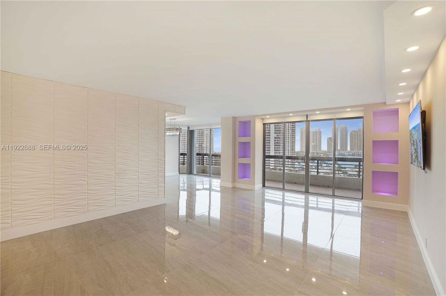 Luxurious, modern, and chic corner condo located in the prestigious Mystic Pointe. Expansive floorplan features floor to ceiling windows & plenty of light. Largest 2/2 condo enjoys the most exquisite upgrades with ABSOLUTELY no details spared. Exceptional porcelain tile throughout, updated bedrooms & bathrooms, new lighting system, side by side w/d, and a remodeled kitchen with breakfast area & lots of storage space with newer appliances & functional cabinet systems. LED lights, fine wall textures, a convenient den and wrap around balcony are some of the features that complete this beautiful flat. Assigned and covered parking. Close to houses of worship, the beach, Don Soffer trail, Aventura Mall, airports. Gym, Tennis club, pickleball, restaurant, marina, playground, lush gardens, electric car stations, and more!