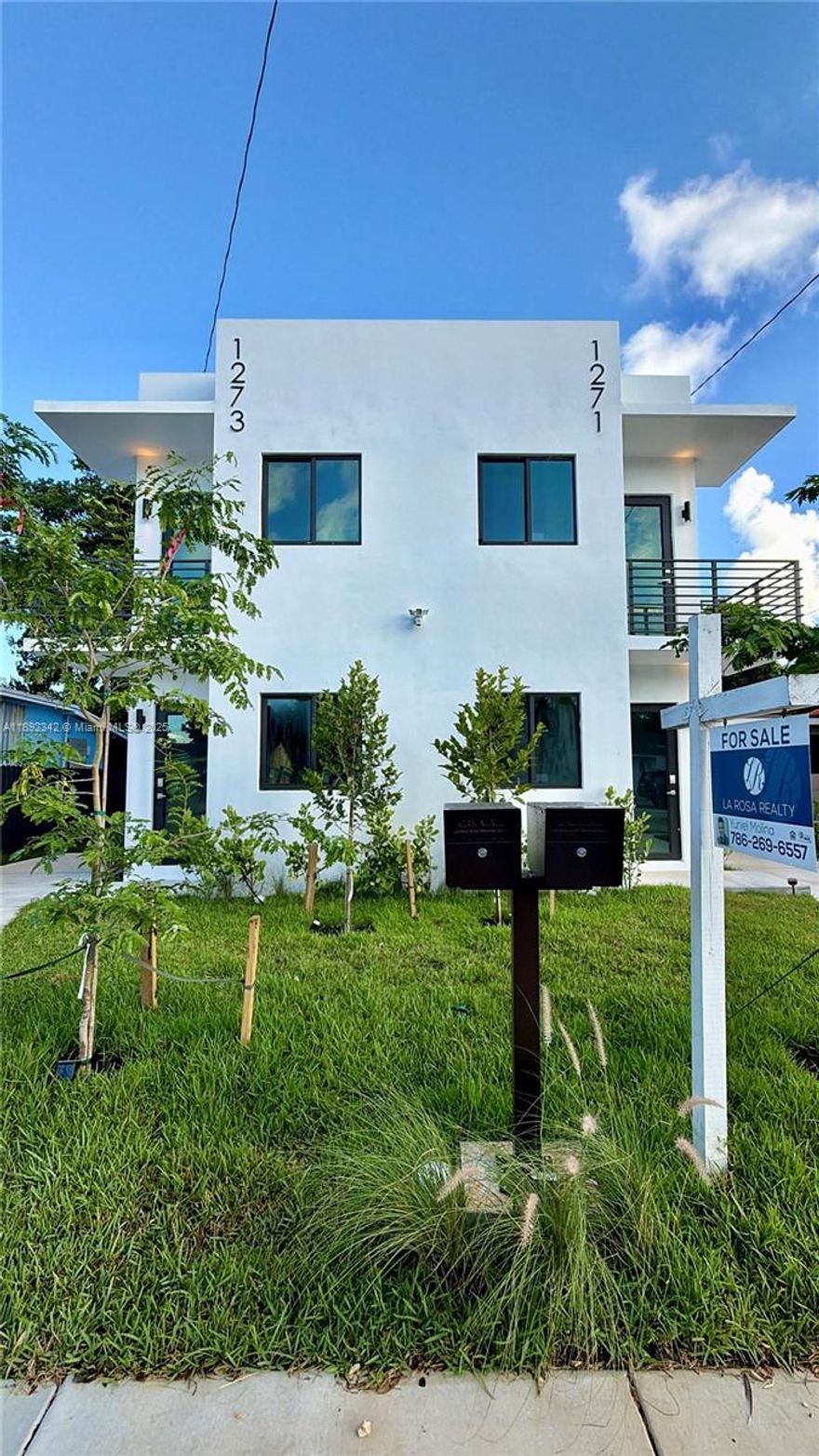 New Construction Luxury Twin Homes near Wynwood and Design district!. Four bedrooms and four bathrooms on each side. Alternatively, use as short term rental and building can make up to $16,000. New kitchen with beautiful new cabinetry and Carrara quartz countertops. Stainless steel appliances. Concrete flooring and concrete roof. Structure is a bunker! Large 60x60 porcelain tiles floor. Four brand new central A/Cs. Security Cameras already installed. Balcony in both front and back with modern aluminum railings. Concrete stairs with beautiful wood looking porcelain tile. Close to MIA, train station, Marlins Stadium and South Beach. Area is booming with luxury multi-family buildings.