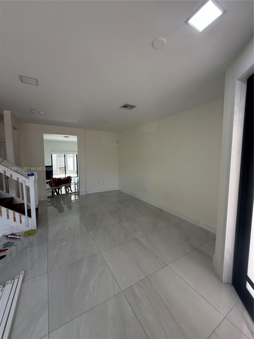 Beautifully maintained Townhouse in the heart of Hialeah Gardens! Stainless steel appliances, washer and dryer, new A/C system , features Modern White-Finish Cabinets, private patio. Upgraded lighting, flooring, washer/dryer. Internet for just $35/month. Private clubhouse, gym, playground, swimming pool, game room, 24-hour security. Upgraded Puronic Water Filter provides filtered water throughout the entire house. Additionally there is a Alkaline drinkable water system under the sink in the kitchen. (Pergola will not be included).