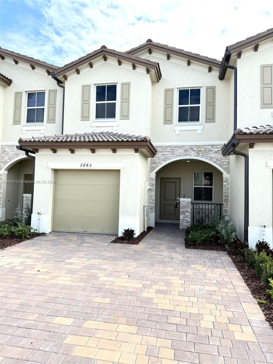 Be the first to live in this stunning brand-new corner-unit townhouse in the highly desirable Altamira Community. Featuring 3 bedrooms, 2.5 bathrooms, and a 1-car garage, this modern home offers a spacious open floor plan with a fully equipped kitchen, quartz countertops, stainless steel appliances, and sleek cabinetry. The second floor includes plush carpeting in all bedrooms and in-unit laundry for added convenience. Enjoy a private, fenced patio ideal for relaxation or entertaining. The community will soon offer amazing amenities like a golf course, tennis courts, gym, and pool. With easy access to the Turnpike and walking distance to schools, this home combines comfort, style, and convenience. Don’t miss out—it won’t last!