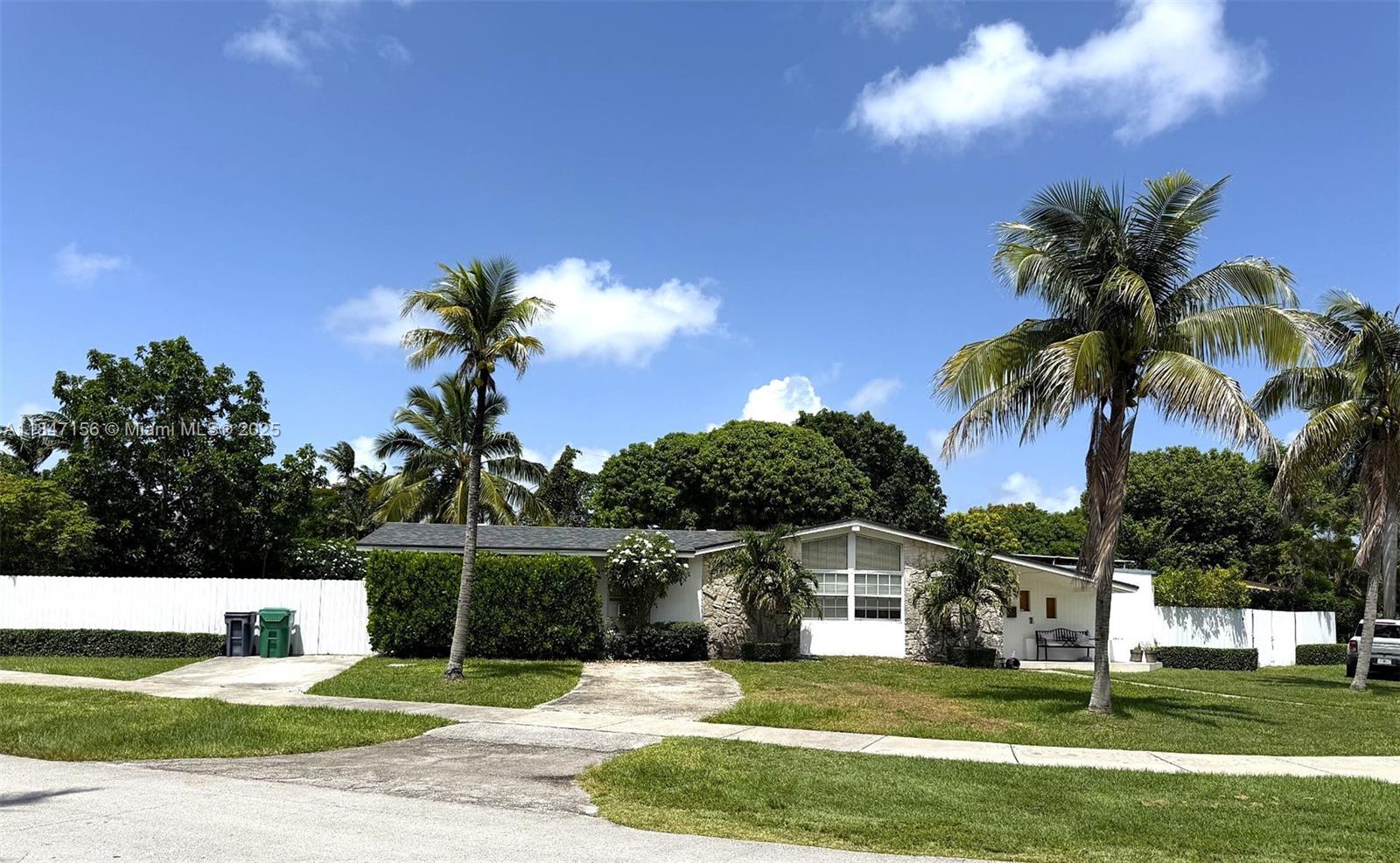 This four-bedroom, two-bathroom home features a permitted 1-bedroom, 1-bath in-law quarter on a large corner lot with mango and avocado trees. Enjoy a relaxing covered porch, new roof, and solar panels. Great for multi-generational living or as an income-producing property, the home can also be used as a three-bedroom, one-bathroom residence with an additional in-law quarter. Don’t miss this unique opportunity to own a versatile property with endless possibilities!