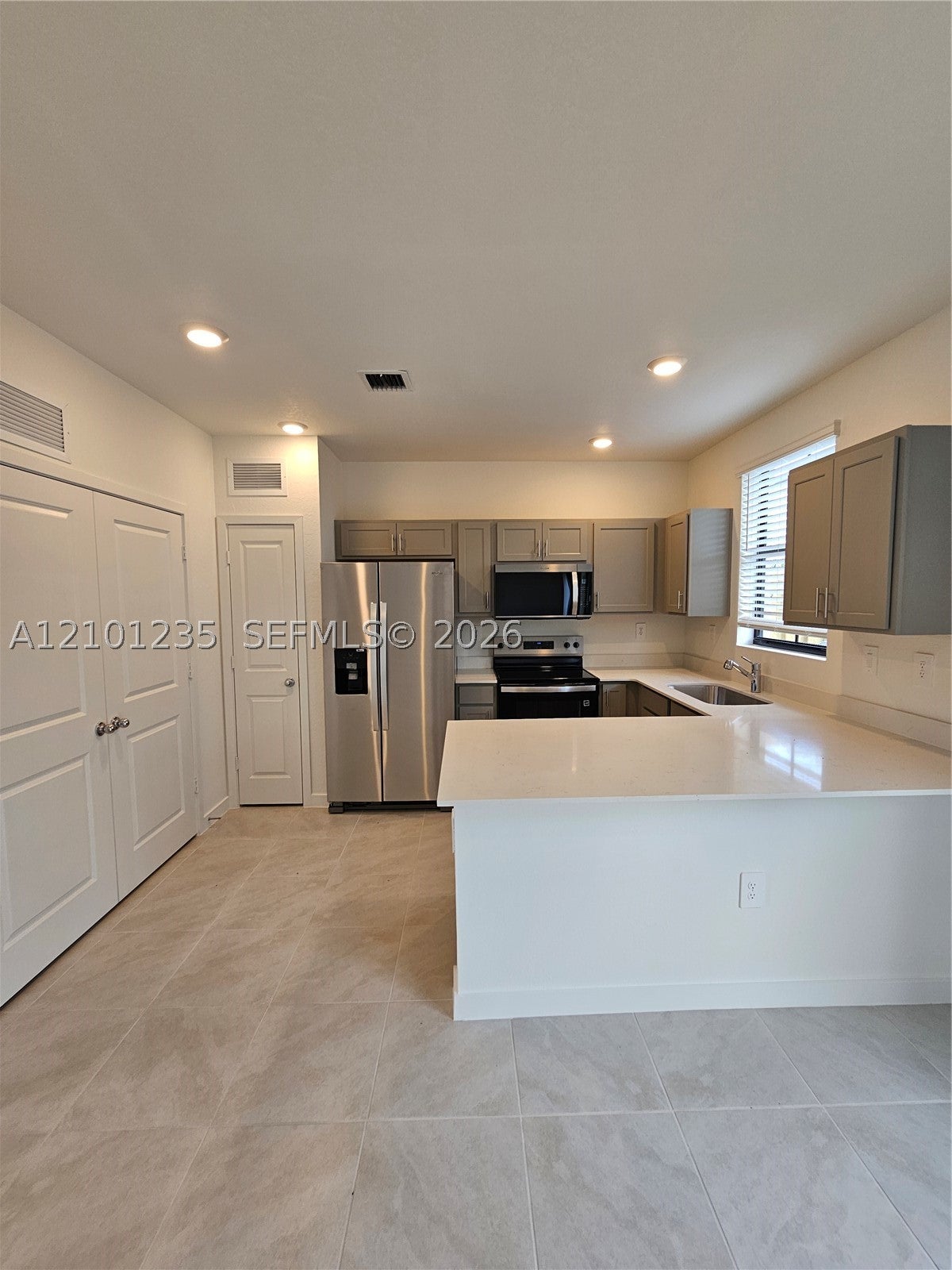 493 NE 15th St