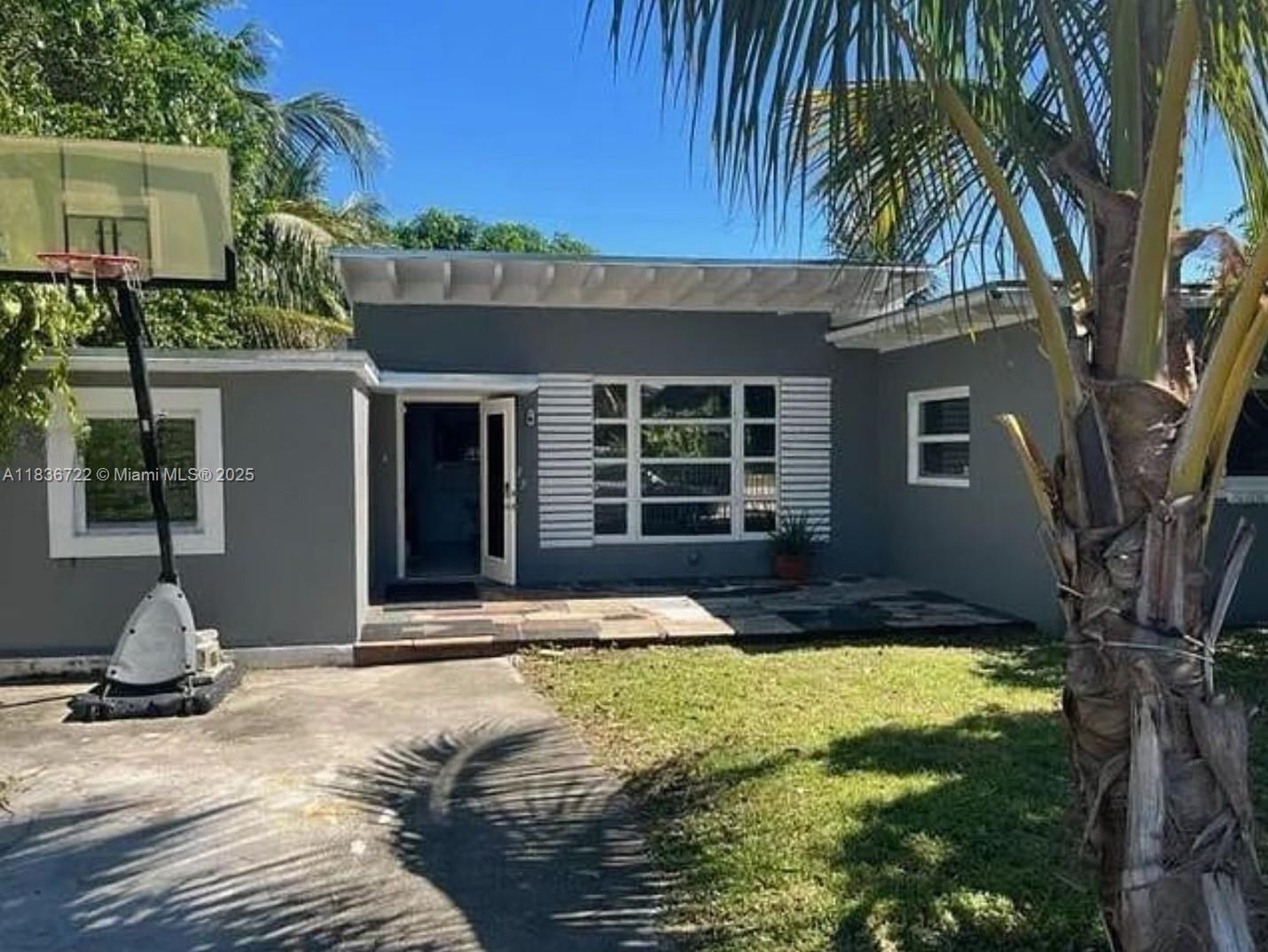 2-bedroom, 1-bathroom home located in a quiet residential neighborhood just minutes from Barry University and Miami Shores. This well-maintained property features a bright, open layout with tile floors throughout, a spacious living area, and a functional kitchen perfect for everyday living.
Enjoy a large fenced backyard with fruit trees—ideal for relaxing or entertaining. The home also includes a covered terrace, driveway parking, and updated fixtures. Conveniently located near major highways, shopping, dining, and public transportation.