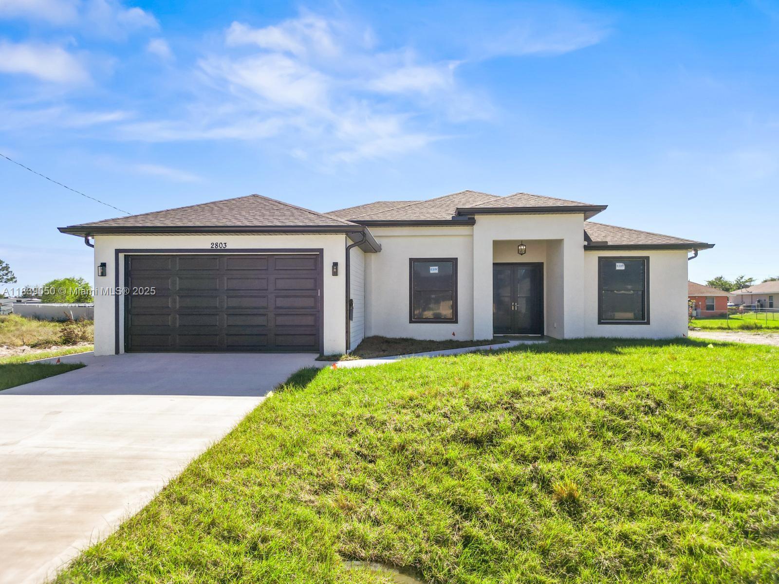 This beautiful single-family residence offers 3 bedrooms, 2 bathrooms, a den with a closet, and a spacious 2-car garage, providing the ideal layout for modern living. The kitchen, designed with elegance in mind, boasts sleek quartz countertops, stainless steel appliances, and durable tile flooring; Perfect for creating memorable meals or hosting family and friends. Built with impact-resistant windows, this home is crafted for your comfort and peace of mind during any season. Its open floor plan maximizes natural light and creates an inviting atmosphere, while the luxurious master suite features a walk-in shower, dual vanities, and a walk-in closet. Located near Highway 82 and with quick access to I-75, this home is just minutes away from shopping, dining, and entertainment options.