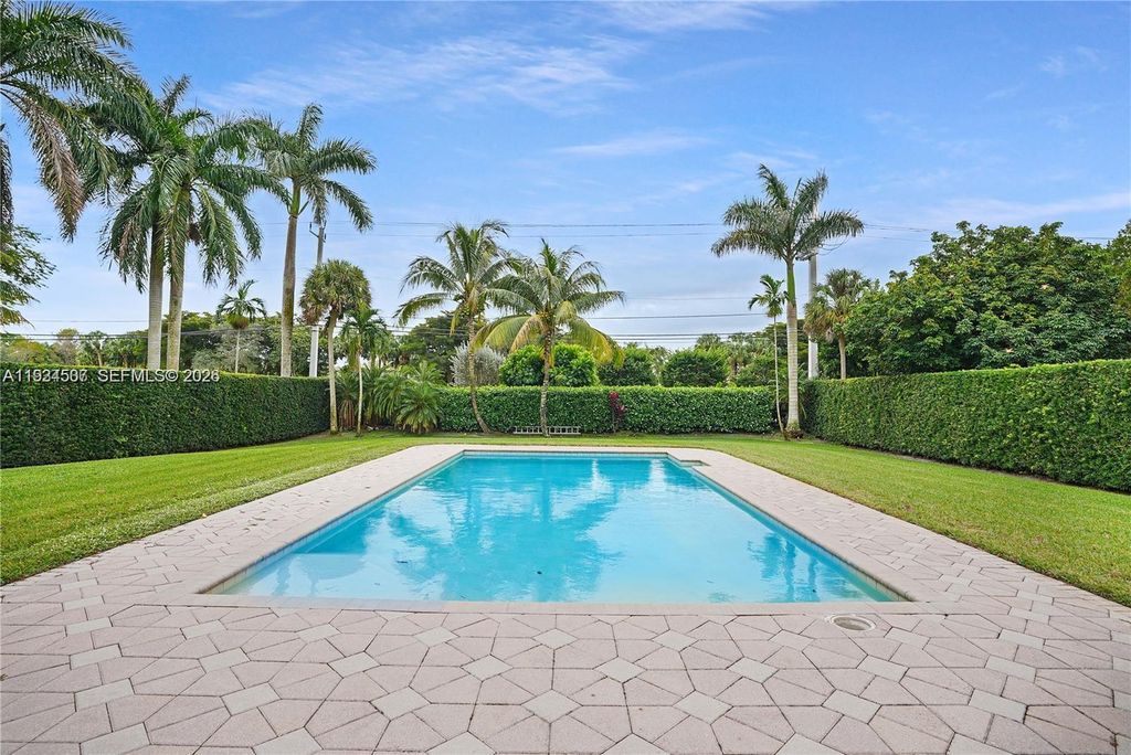 Photo of 11242 SW 25th Ct, Davie, FL 33325 (MLS # A11934507)