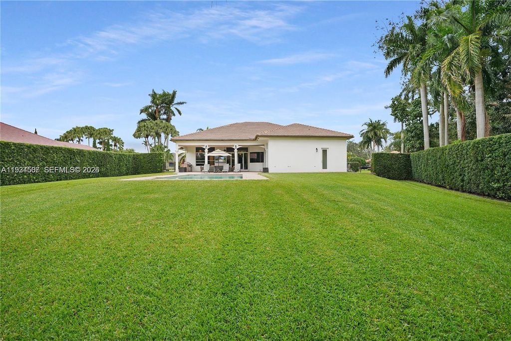 Photo of 11242 SW 25th Ct, Davie, FL 33325 (MLS # A11934507)